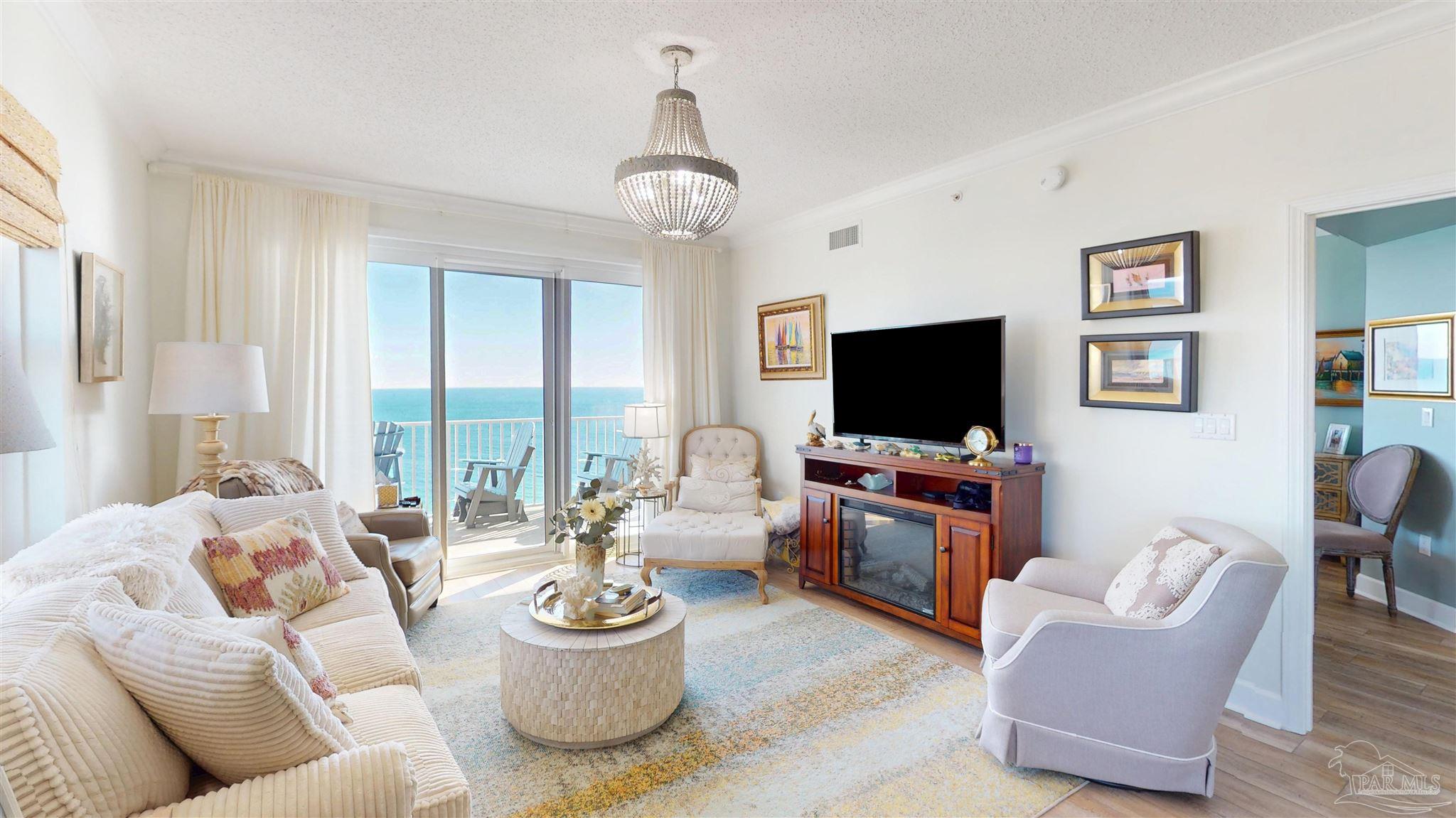 14511 Perdido Key Drive, Unit 1301 Perdido Key, FL 32507 - Photo 1 of 65 a living room with furniture and a flat screen tv
