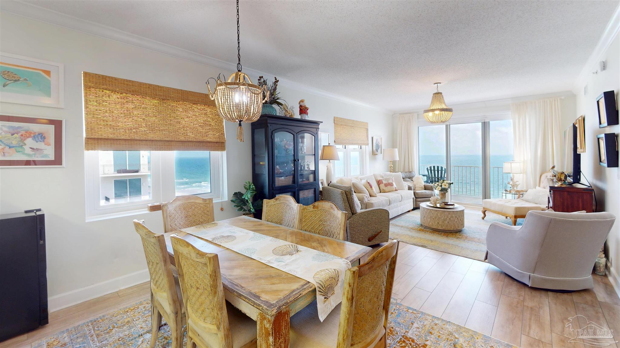 14511 Perdido Key Drive, Unit 1301 Perdido Key, FL 32507 - Photo 18 of 65 a view of a dining room with furniture window and wooden floor