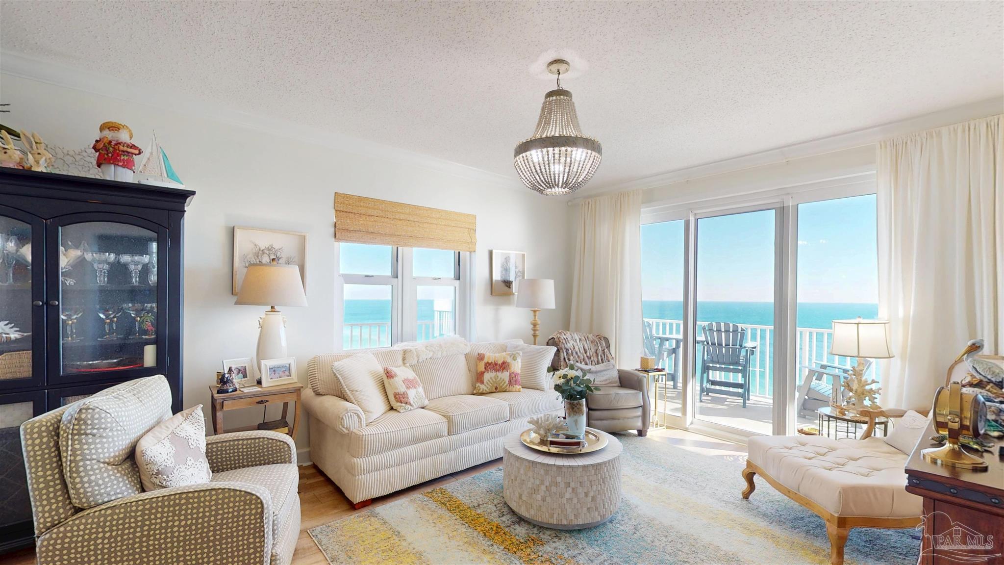 14511 Perdido Key Drive, Unit 1301 Perdido Key, FL 32507 - Photo 20 of 65 a living room with furniture and a large window with garden view