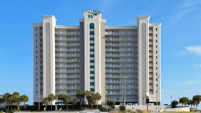 a view of balcony with furniture