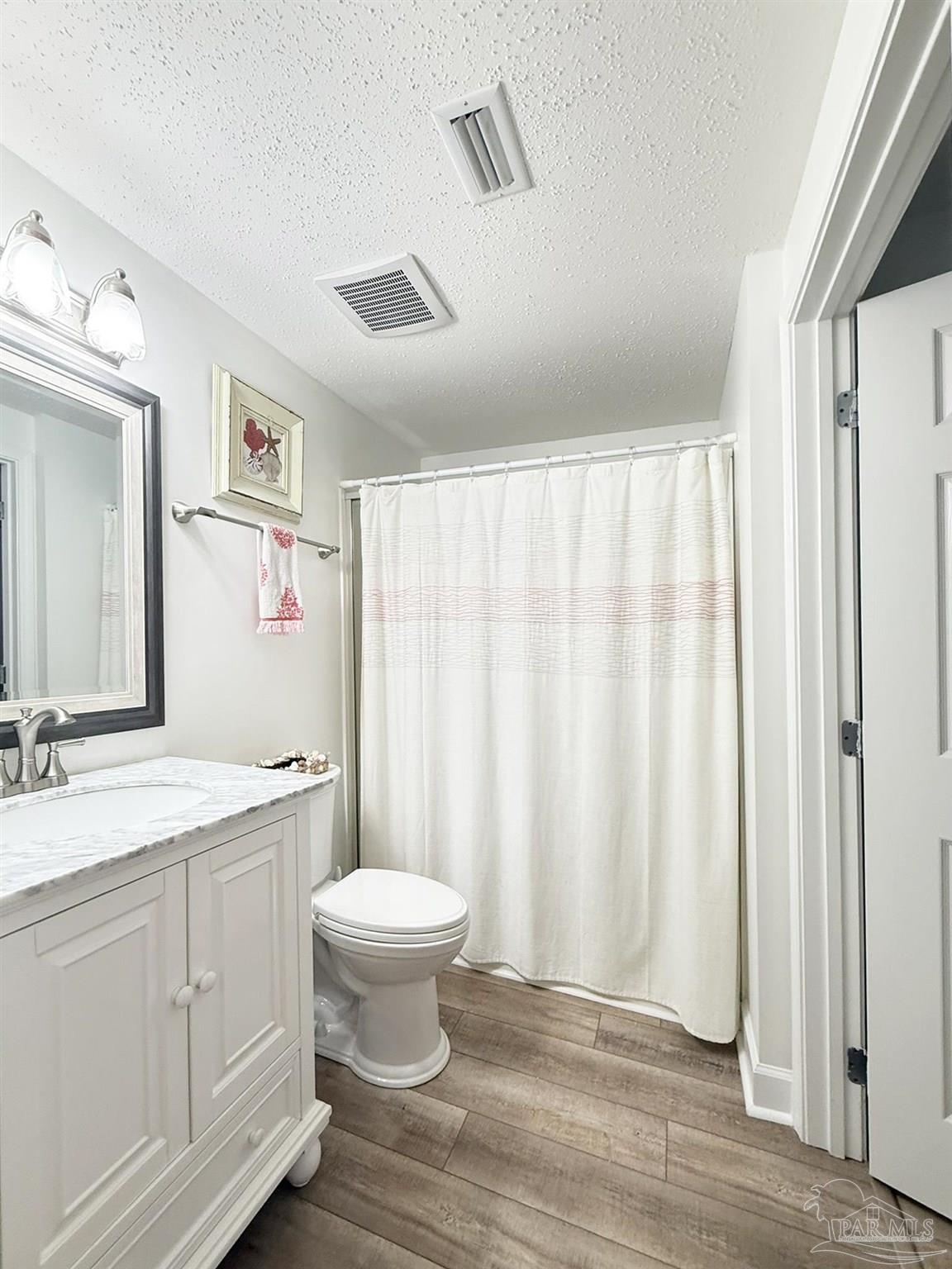 14511 Perdido Key Drive, Unit 1301 Perdido Key, FL 32507 - Photo 42 of 65 a bathroom with a sink toilet and shower