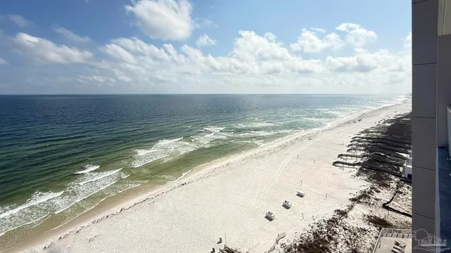 a view of a balcony with wooden floor
