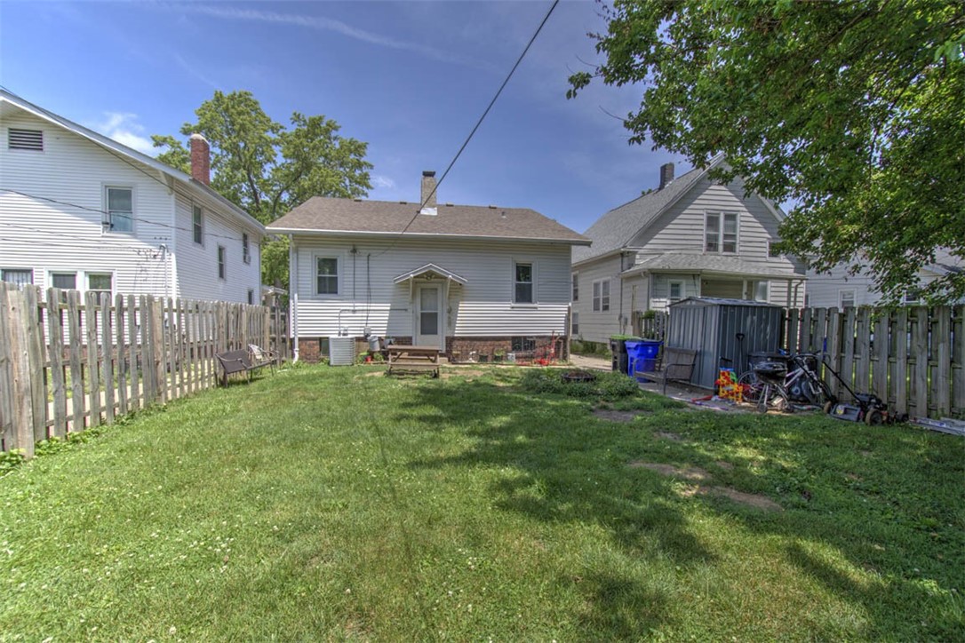 739 West Cushing Street Decatur, IL 62526 - Photo 24 of 28 a view of a house with a yard and sitting area
