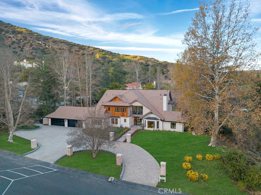 29269 Wagon Road Agoura Hills, CA 91301 - Photo 2 of 53 a aerial view of a house with a yard