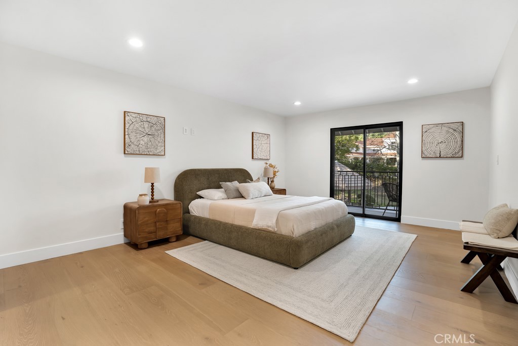 29269 Wagon Road Agoura Hills, CA 91301 - Photo 40 of 53 a bedroom with a bed and a window