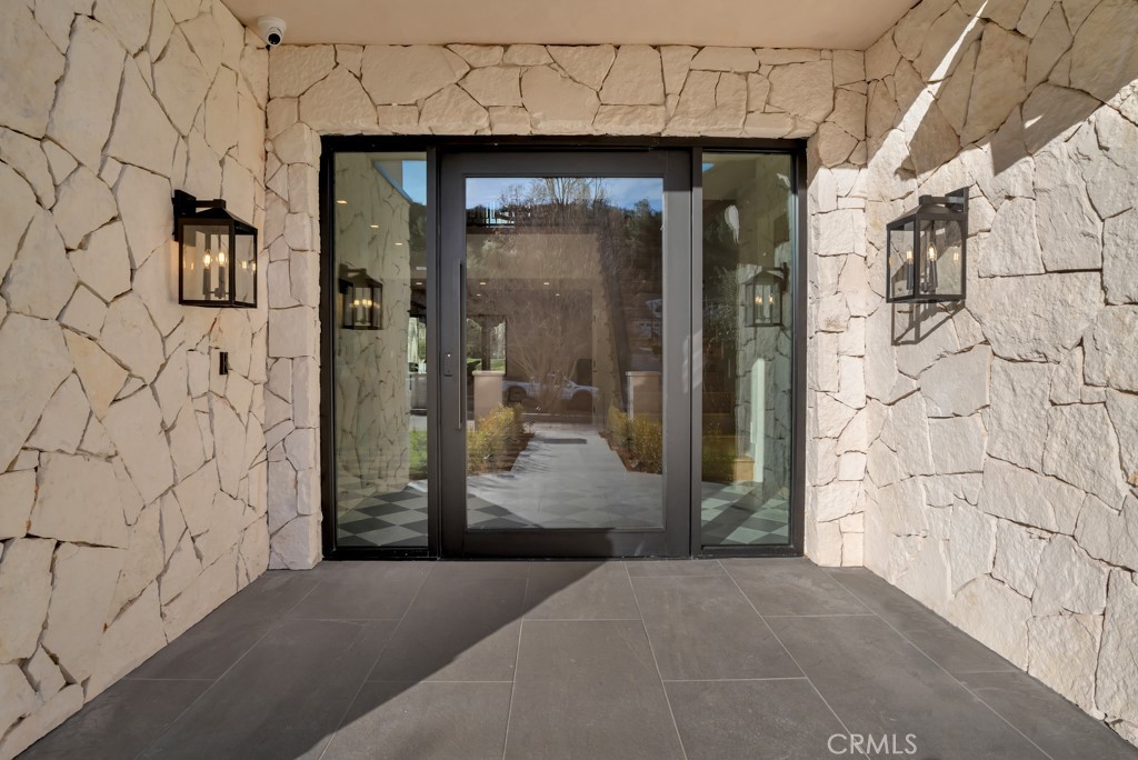 29269 Wagon Road Agoura Hills, CA 91301 - Photo 7 of 53 a view of a entryway door front of house