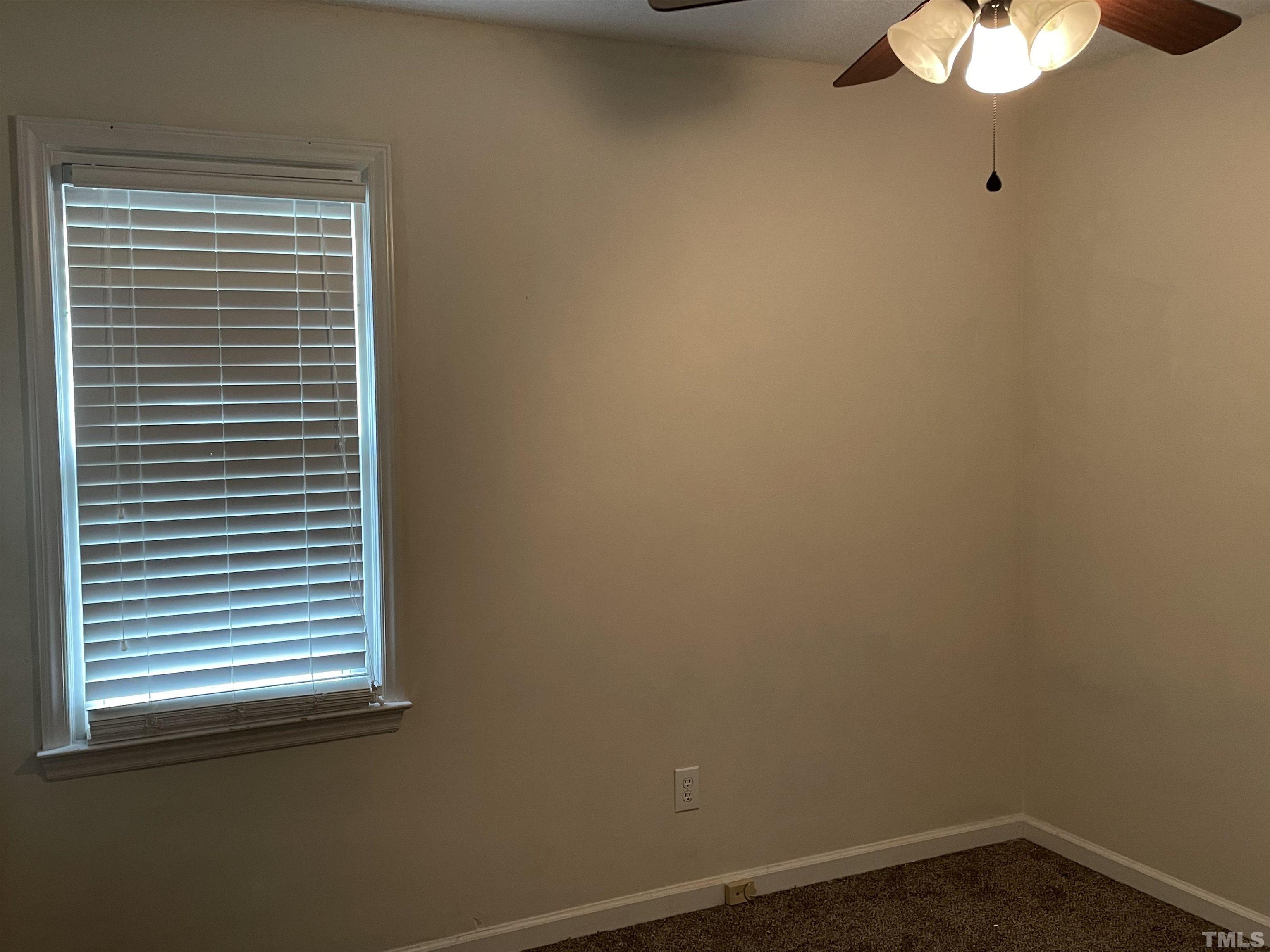 112 Windgate Court Raleigh, NC 27603 - Photo 3 of 10 a small space with a window