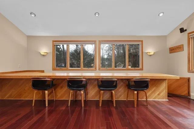 a kitchen with a table and chairs