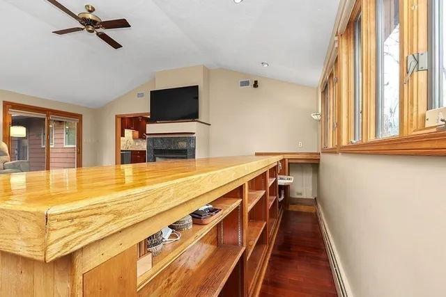 a view of a living room with a flat screen tv