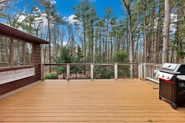a view of a balcony with chairs