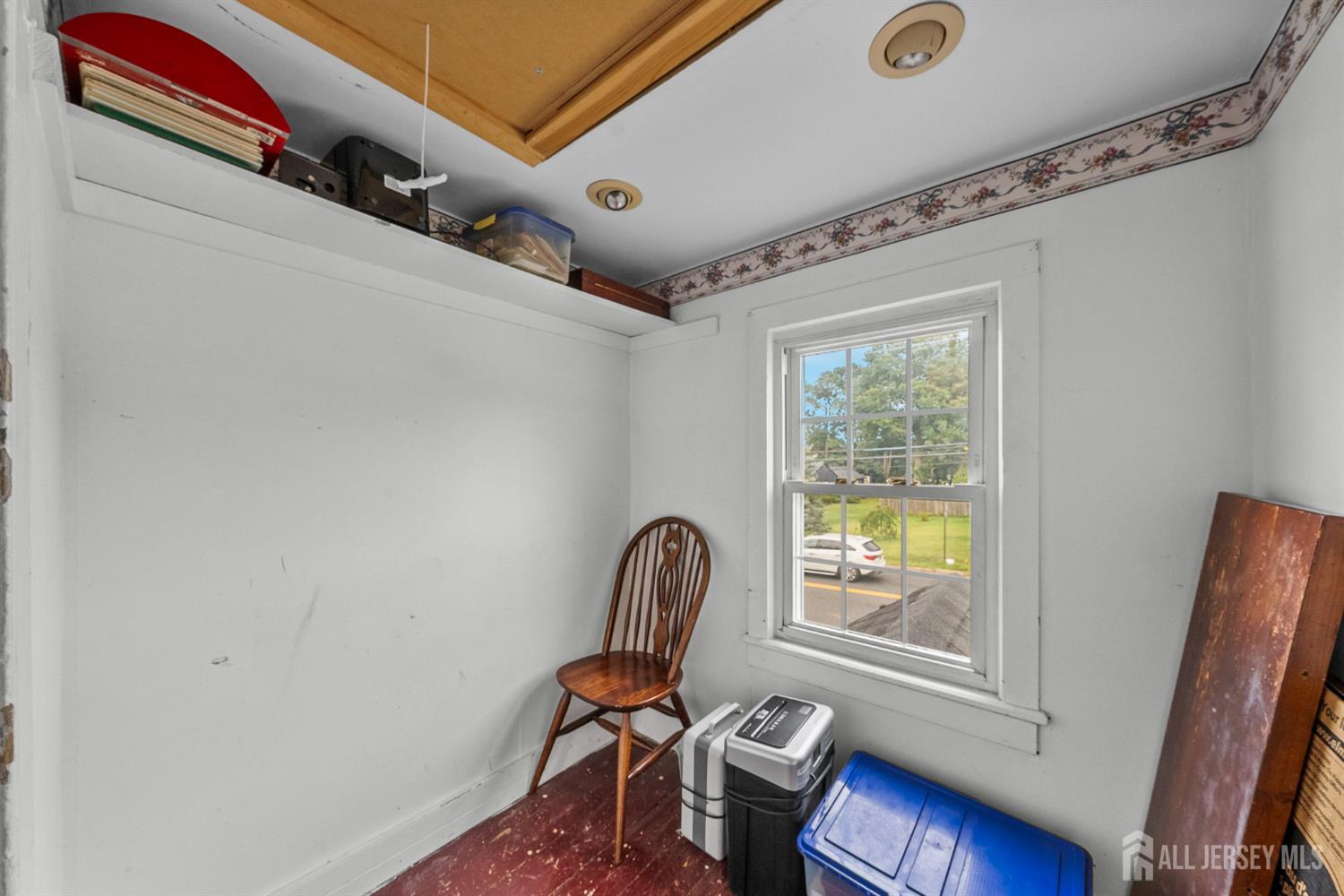 202 Ravine Drive Matawan, NJ 07747 - Photo 30 of 41 a room with furniture and a window