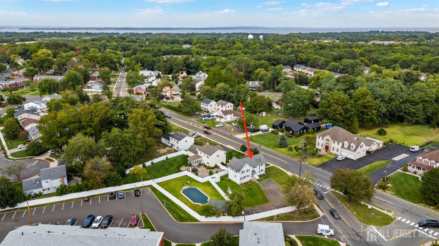 202 Ravine Drive Matawan, NJ 07747 - Photo 38 of 41 an aerial view of residential house with outdoor space and swimming pool
