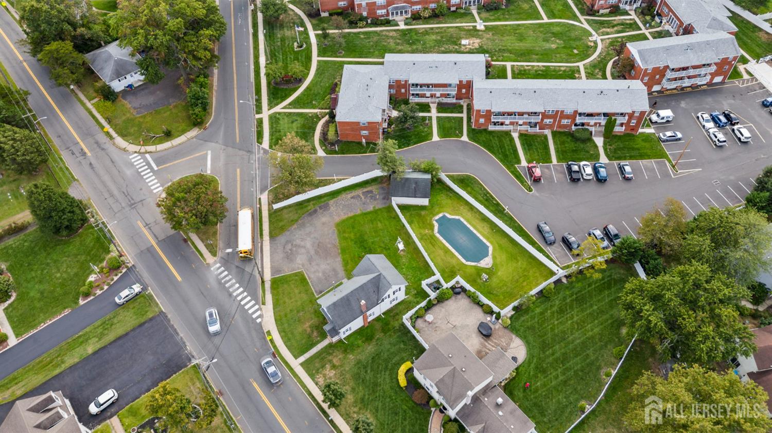 202 Ravine Drive Matawan, NJ 07747 - Photo 40 of 41 an aerial view of a house with a big yard and potted plants