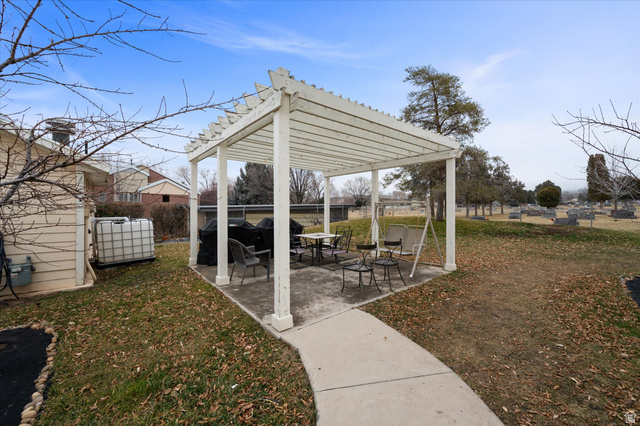 2095 South Main Street, Unit 13 Bountiful, UT 84010 - Photo 30 of 45 Fenced yard featuring a patio and a pergola