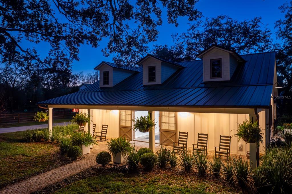 10101 Tarpon Springs Road Odessa, FL 33556 - Photo 51 of 53 a front view of a house with garden
