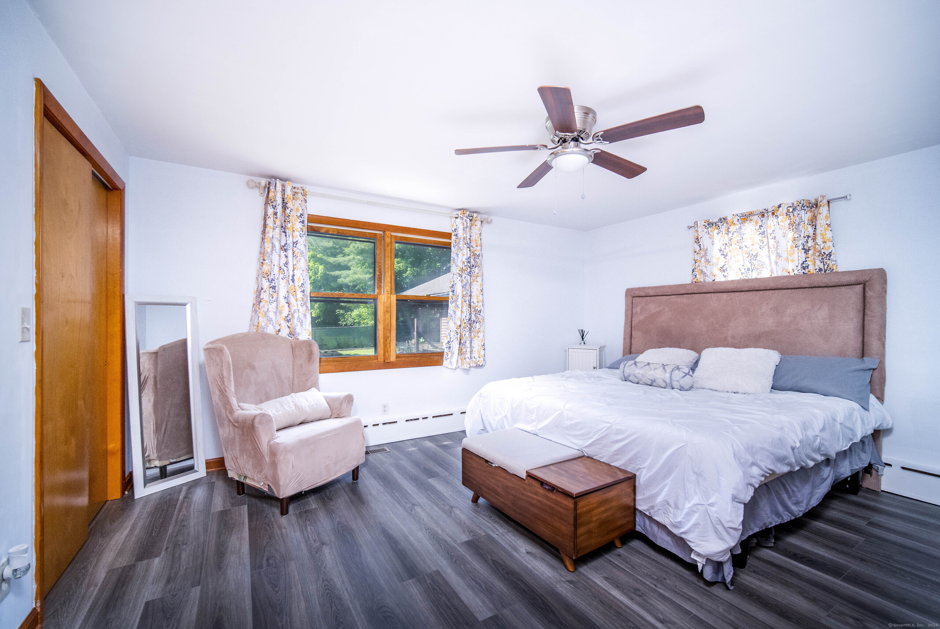 147 Funston Avenue Torrington, CT 06790 - Photo 11 of 40 a bedroom with a bed couch and a window