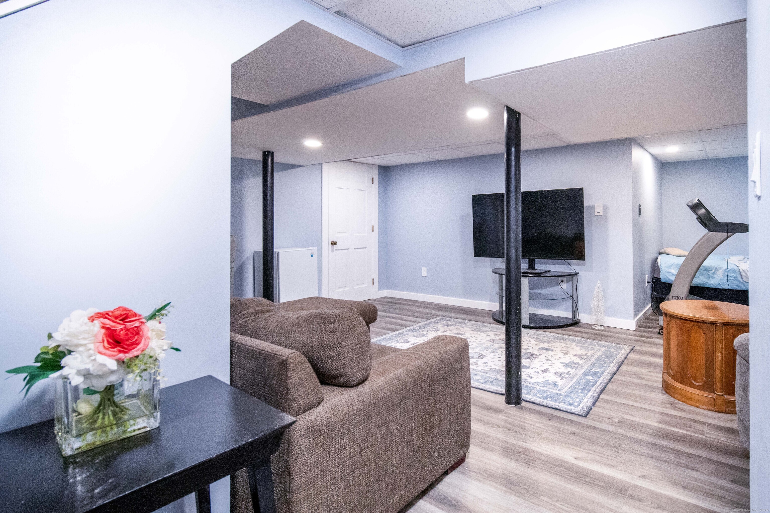 147 Funston Avenue Torrington, CT 06790 - Photo 18 of 40 a living room with furniture and a flat screen tv