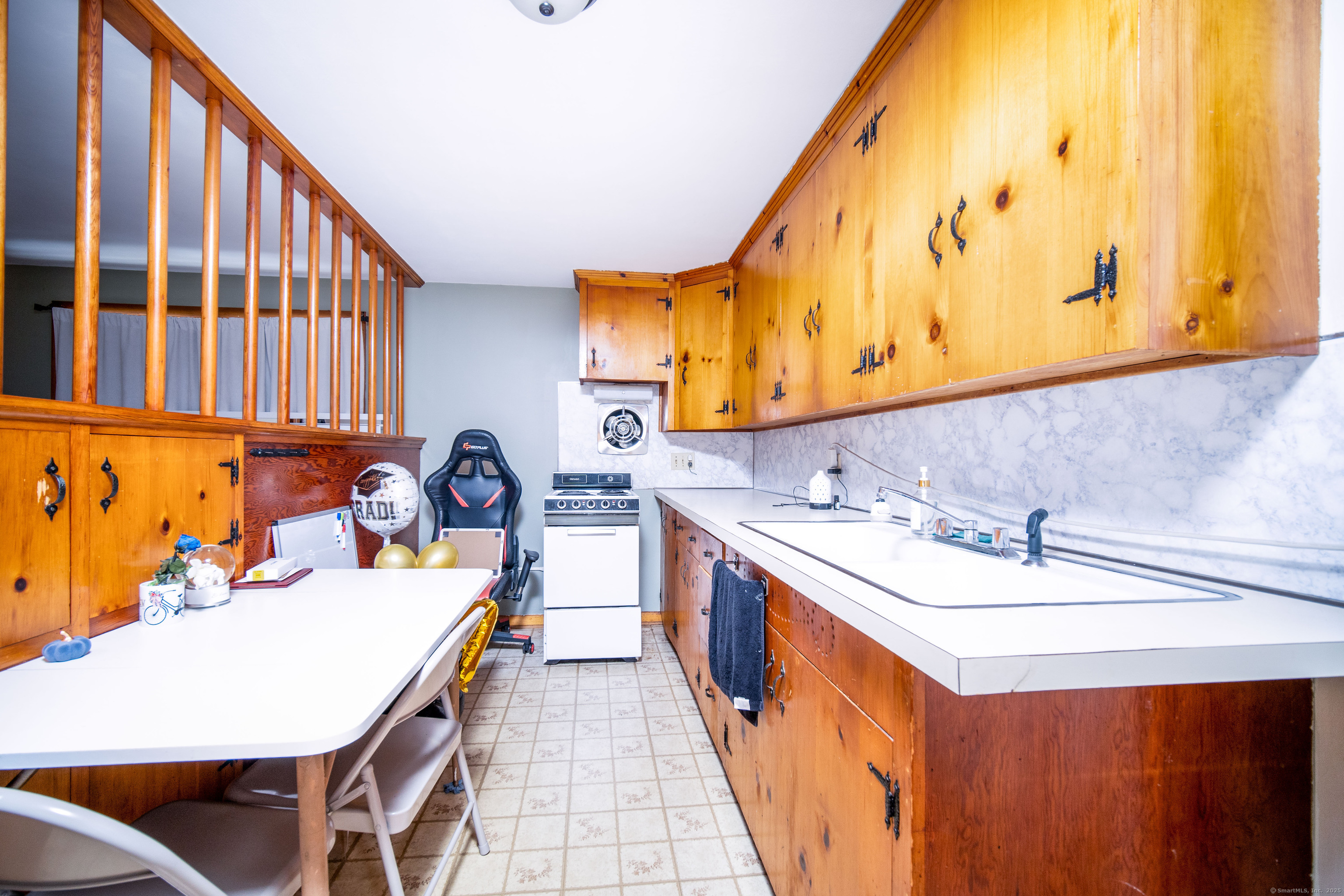147 Funston Avenue Torrington, CT 06790 - Photo 21 of 40 a bathroom with a sink and a mirror