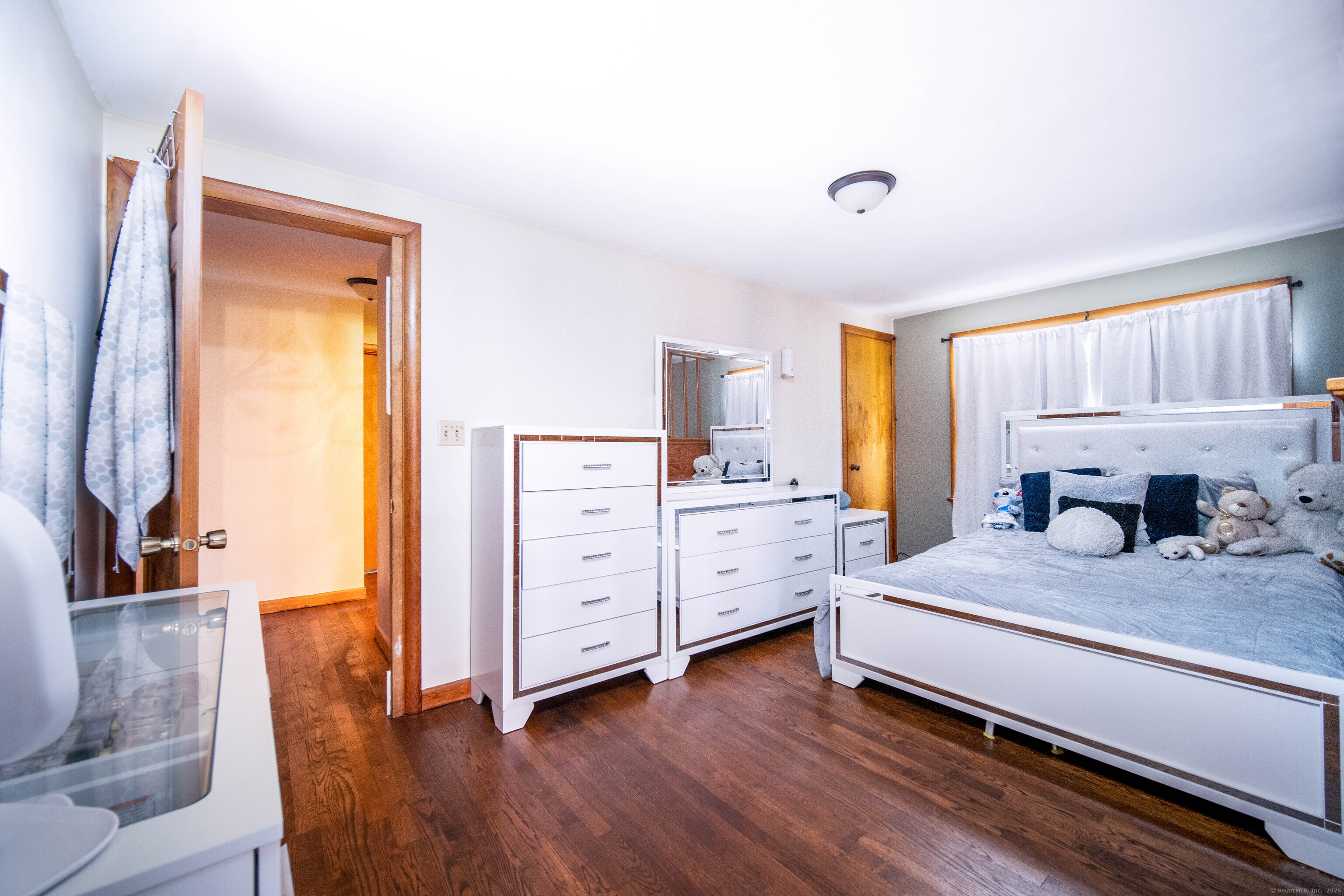 147 Funston Avenue Torrington, CT 06790 - Photo 22 of 40 a bedroom with a bed and a dresser