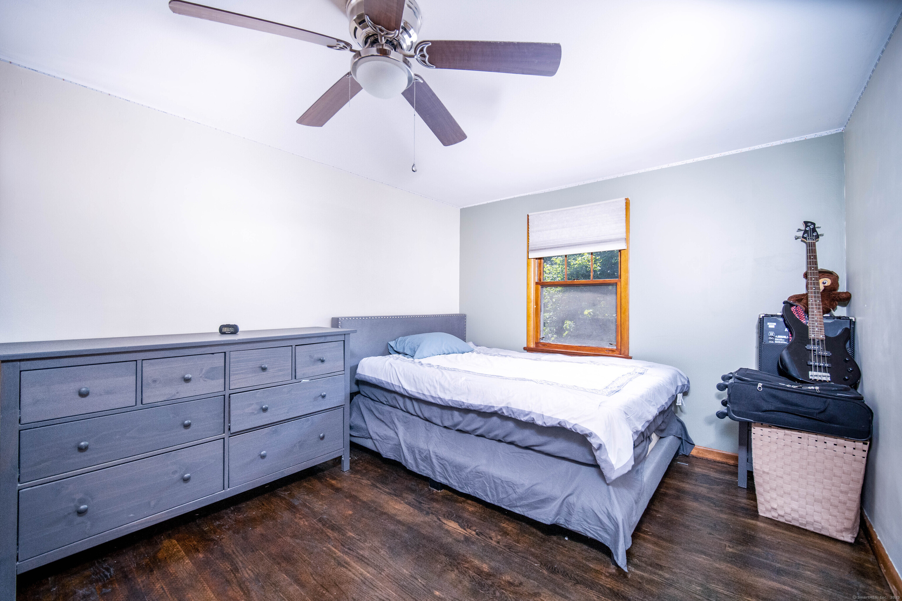 147 Funston Avenue Torrington, CT 06790 - Photo 23 of 40 a bedroom with a bed and a dresser