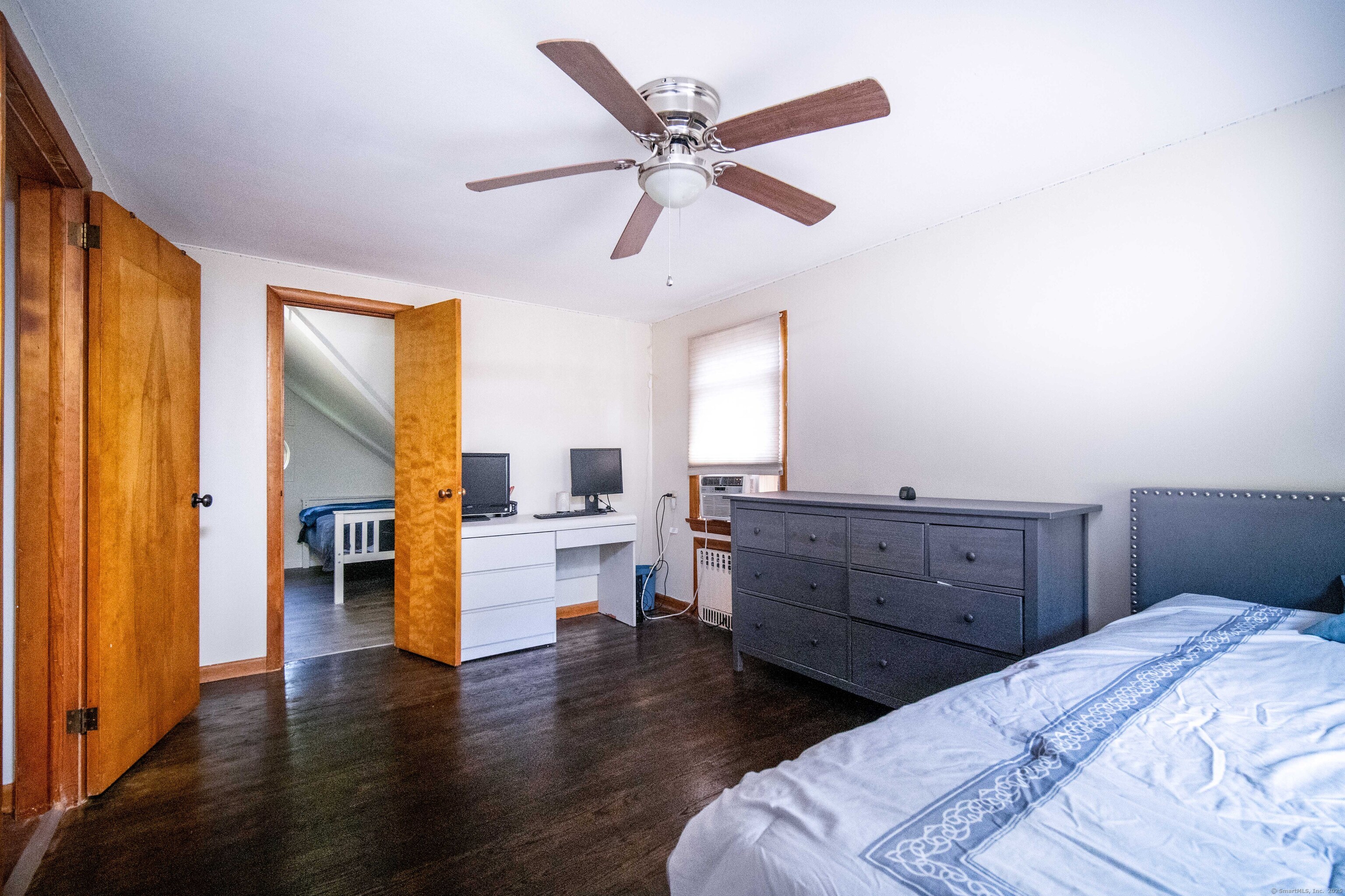 147 Funston Avenue Torrington, CT 06790 - Photo 24 of 40 a bed room with a bed and a window