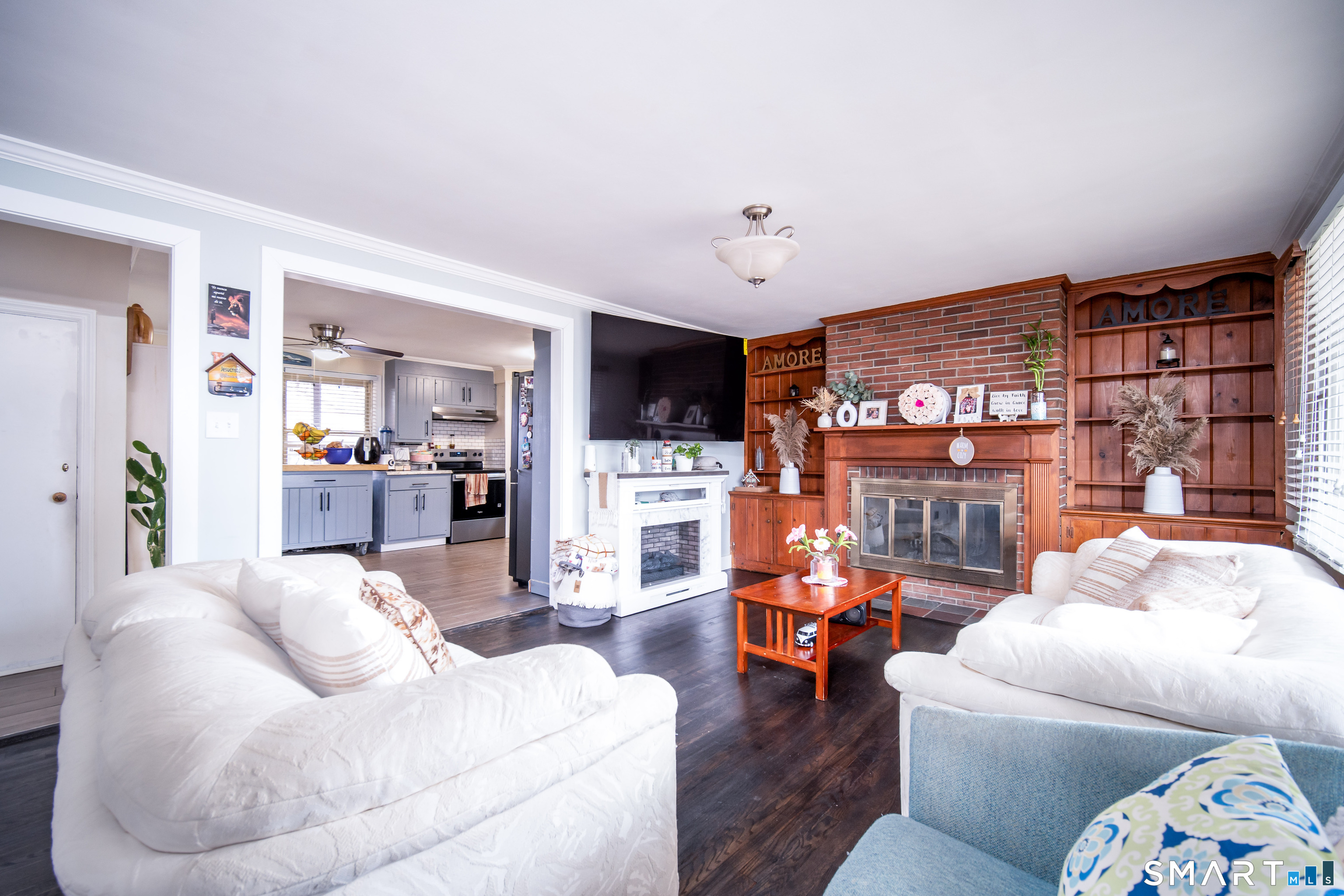 147 Funston Avenue Torrington, CT 06790 - Photo 3 of 40 a living room with furniture and a flat screen tv