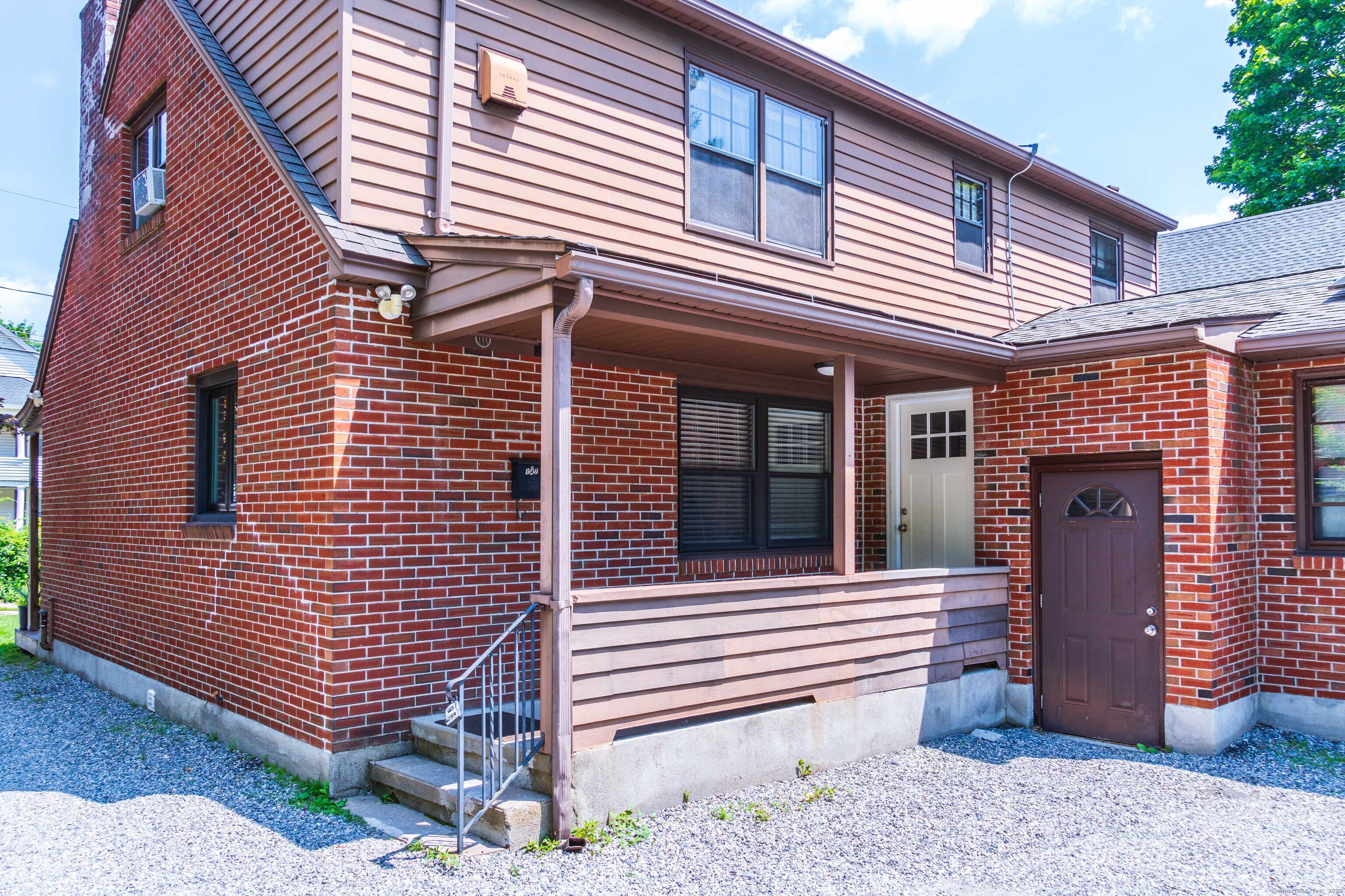 147 Funston Avenue Torrington, CT 06790 - Photo 34 of 40 a view of a house with a yard and garage