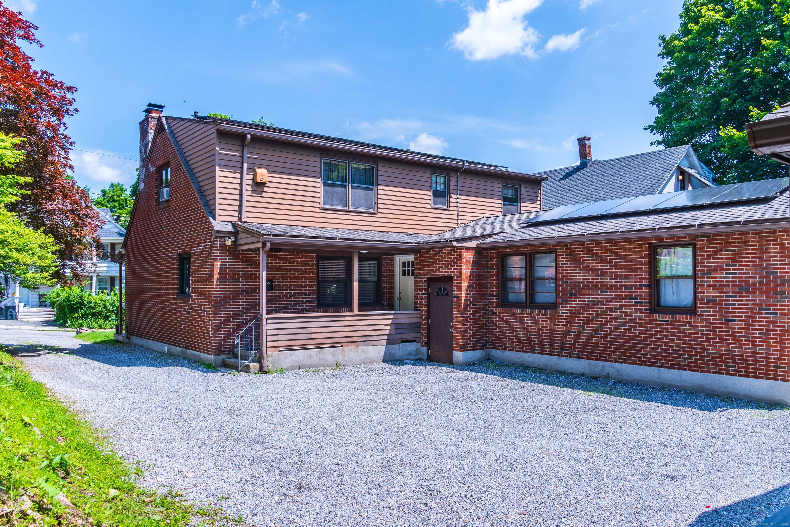 147 Funston Avenue Torrington, CT 06790 - Photo 35 of 40 a front view of a house with a yard