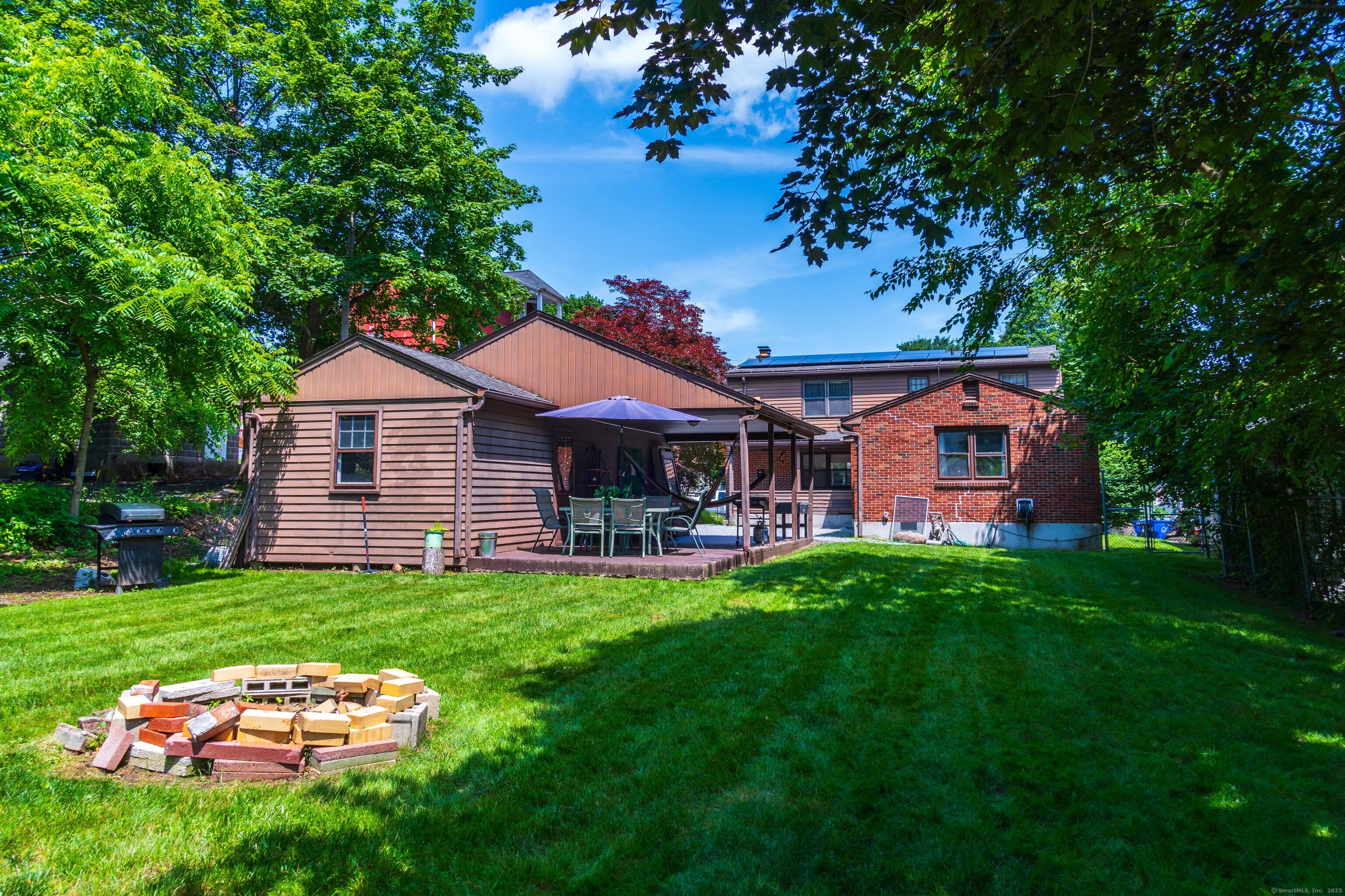 147 Funston Avenue Torrington, CT 06790 - Photo 38 of 40 a front view of a house with garden