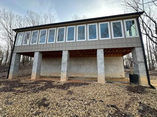 a front view of a house with parking