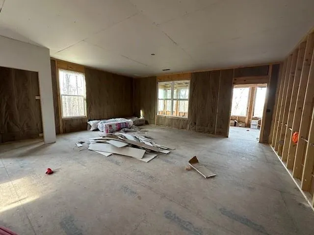 a view of front door with chair and door