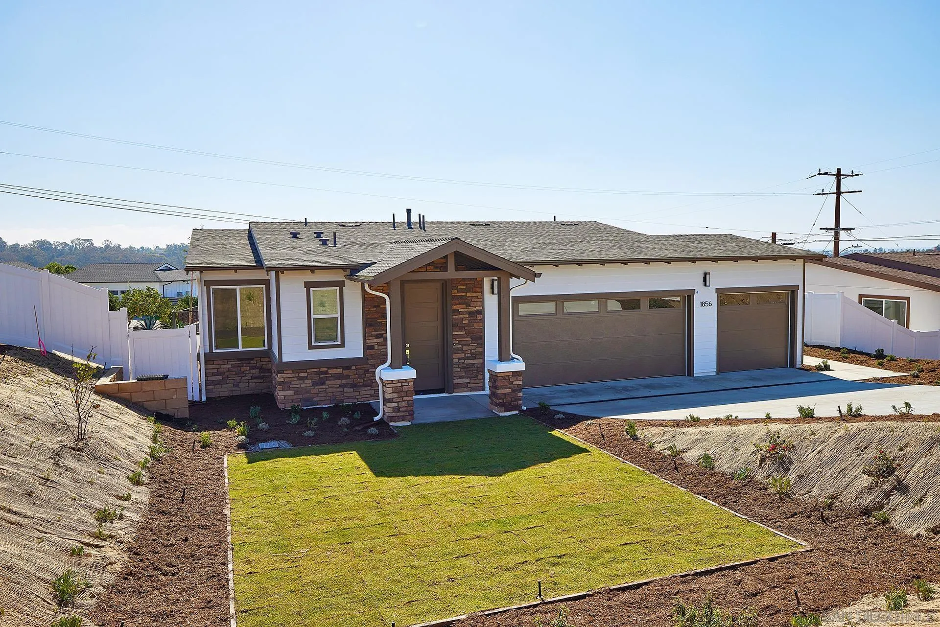 a view of a house with swimming pool and porch