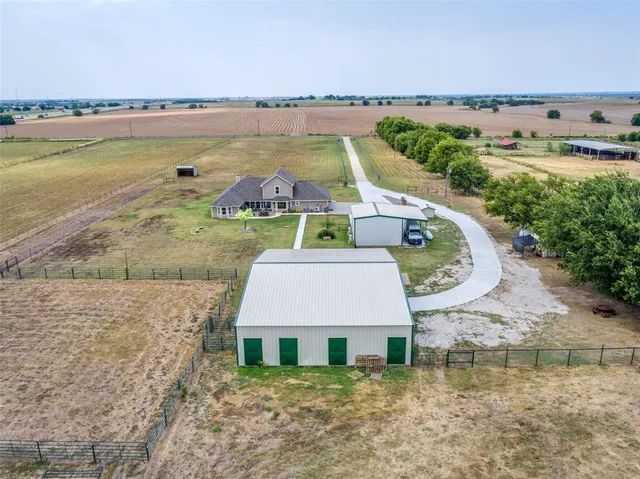 a view of a lake with a yard and outdoor space