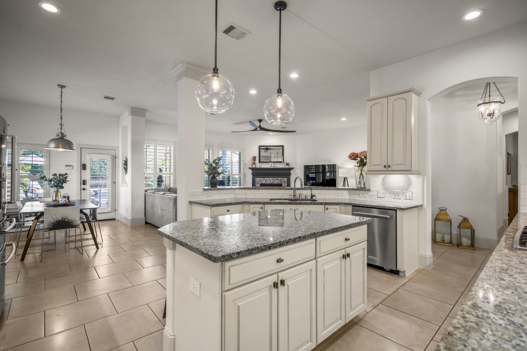 3710 Snowden Point Lane Spring, TX 77386 - Photo 13 of 50 The open layout seamlessly connects to the dining area and living room, creating a bright and inviting atmosphere.