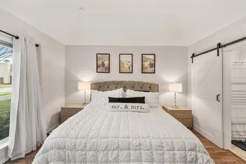 a large white bed in a white room