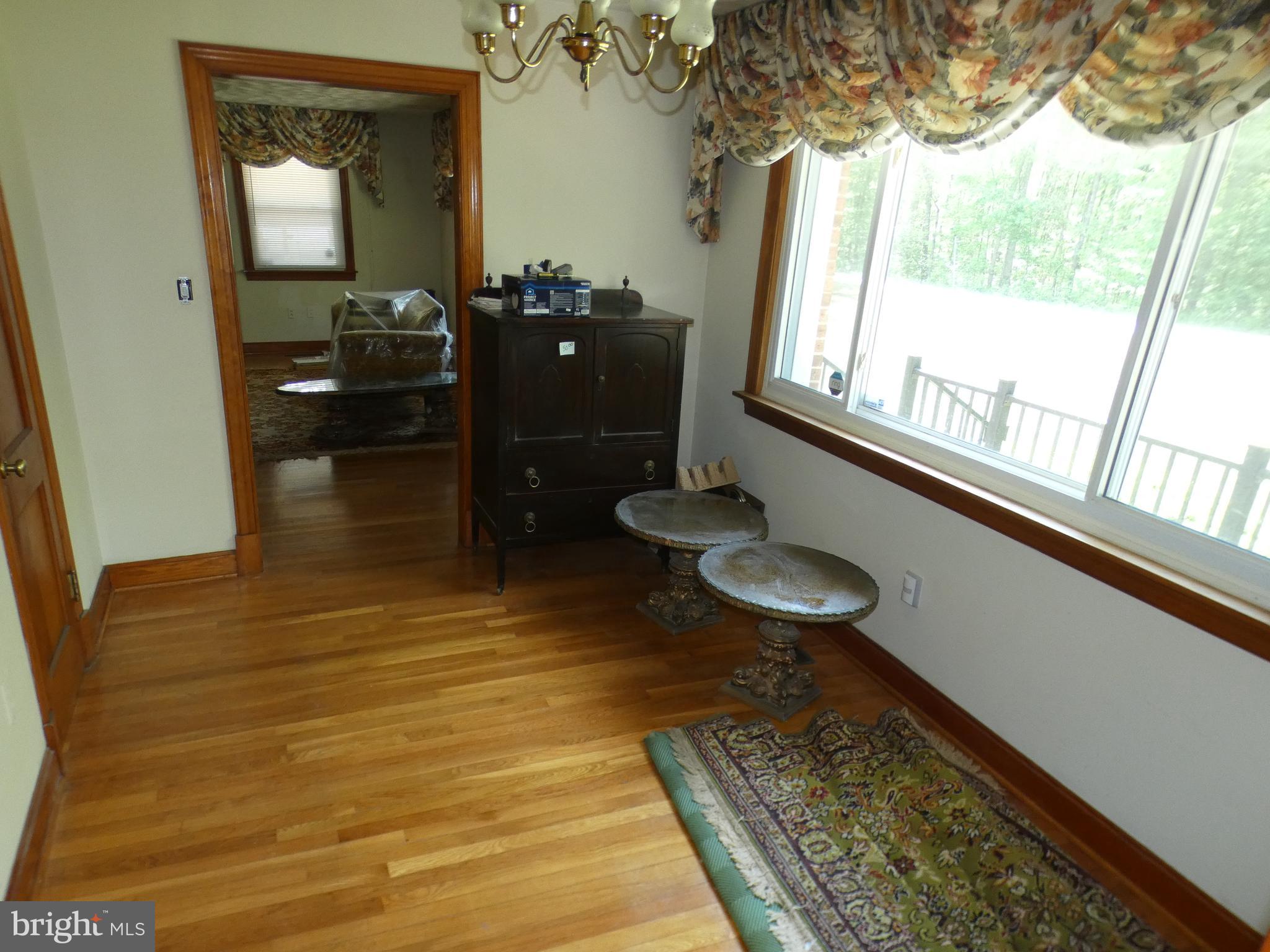 9517 Brock Road Spotsylvania, VA 22553 - Photo 5 of 27 a room with furniture and a large window