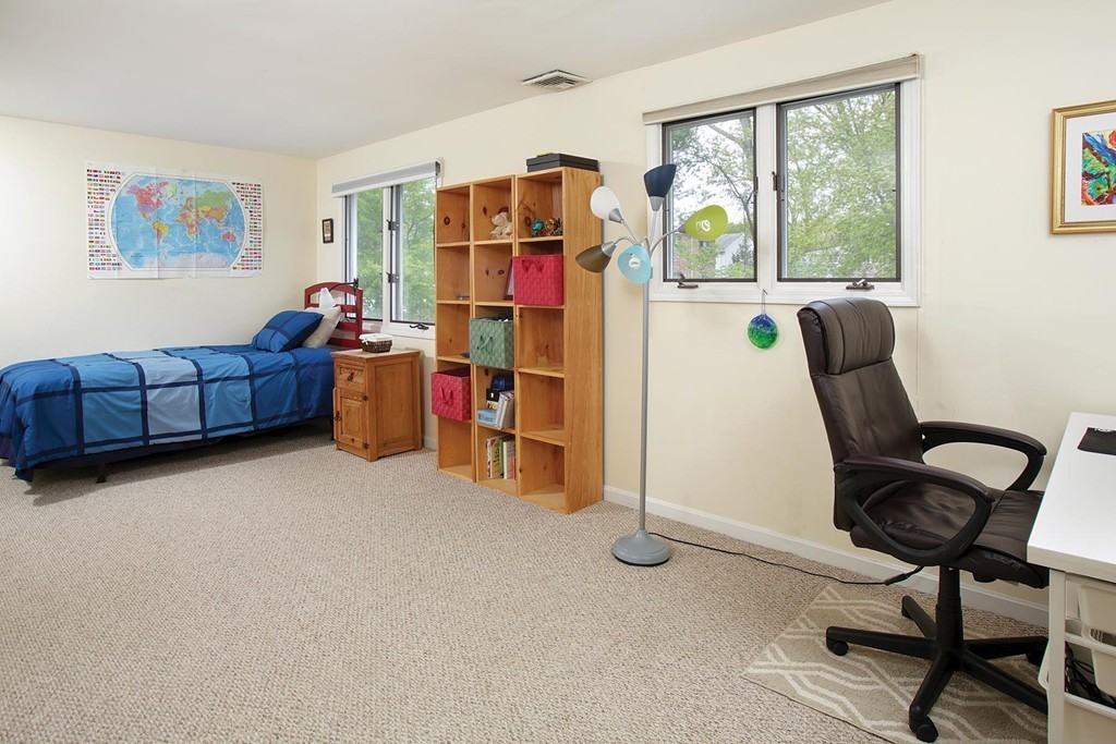 50 Undine Road, Unit 5 Brighton, MA 02135 - Photo 5 of 11 a living room with furniture and a window