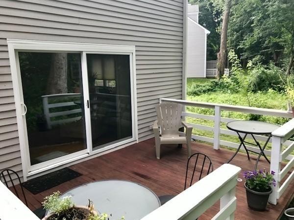 50 Undine Road, Unit 5 Brighton, MA 02135 - Photo 7 of 11 a view of a chairs and table in the balcony