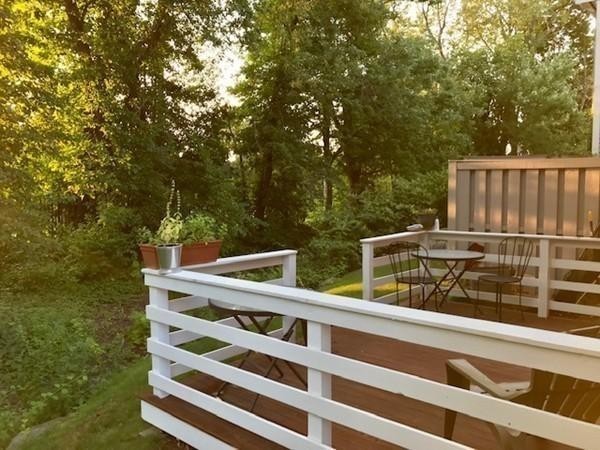 50 Undine Road, Unit 5 Brighton, MA 02135 - Photo 8 of 11 a view of balcony with wooden floor and fence