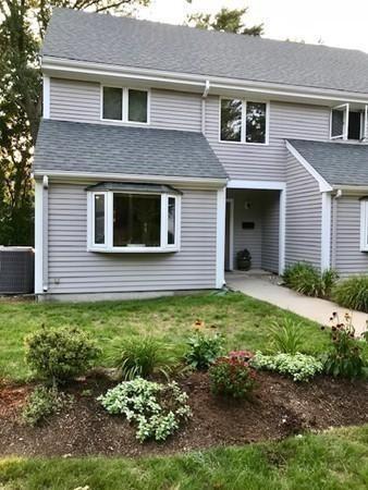 50 Undine Road, Unit 5 Brighton, MA 02135 - Photo 10 of 11 a front view of a house with a yard