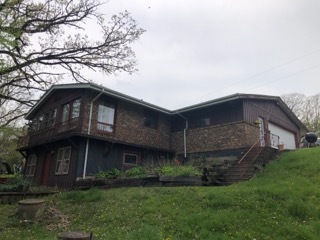 1600 Middletree Road Joliet, IL 60433 - Photo 1 of 22 a front view of a house with a garden