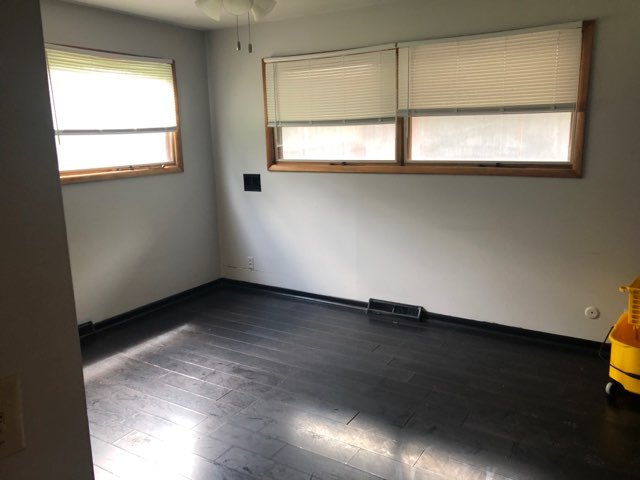 1600 Middletree Road Joliet, IL 60433 - Photo 11 of 22 an empty room with wooden floor and windows