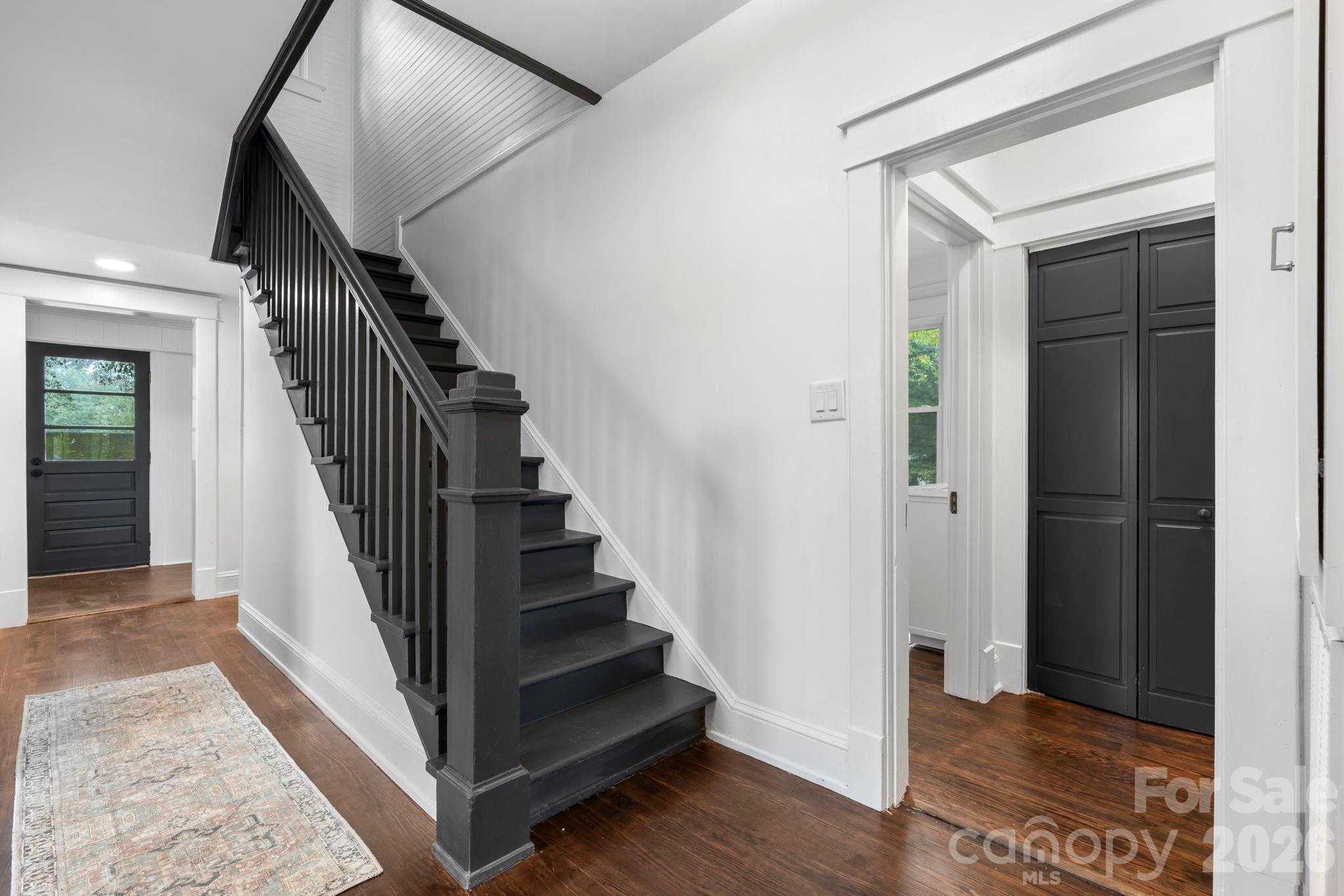 1590 South Center Street Hickory, NC 28602 - Photo 15 of 29 a view of a hallway with wooden floor and entryway