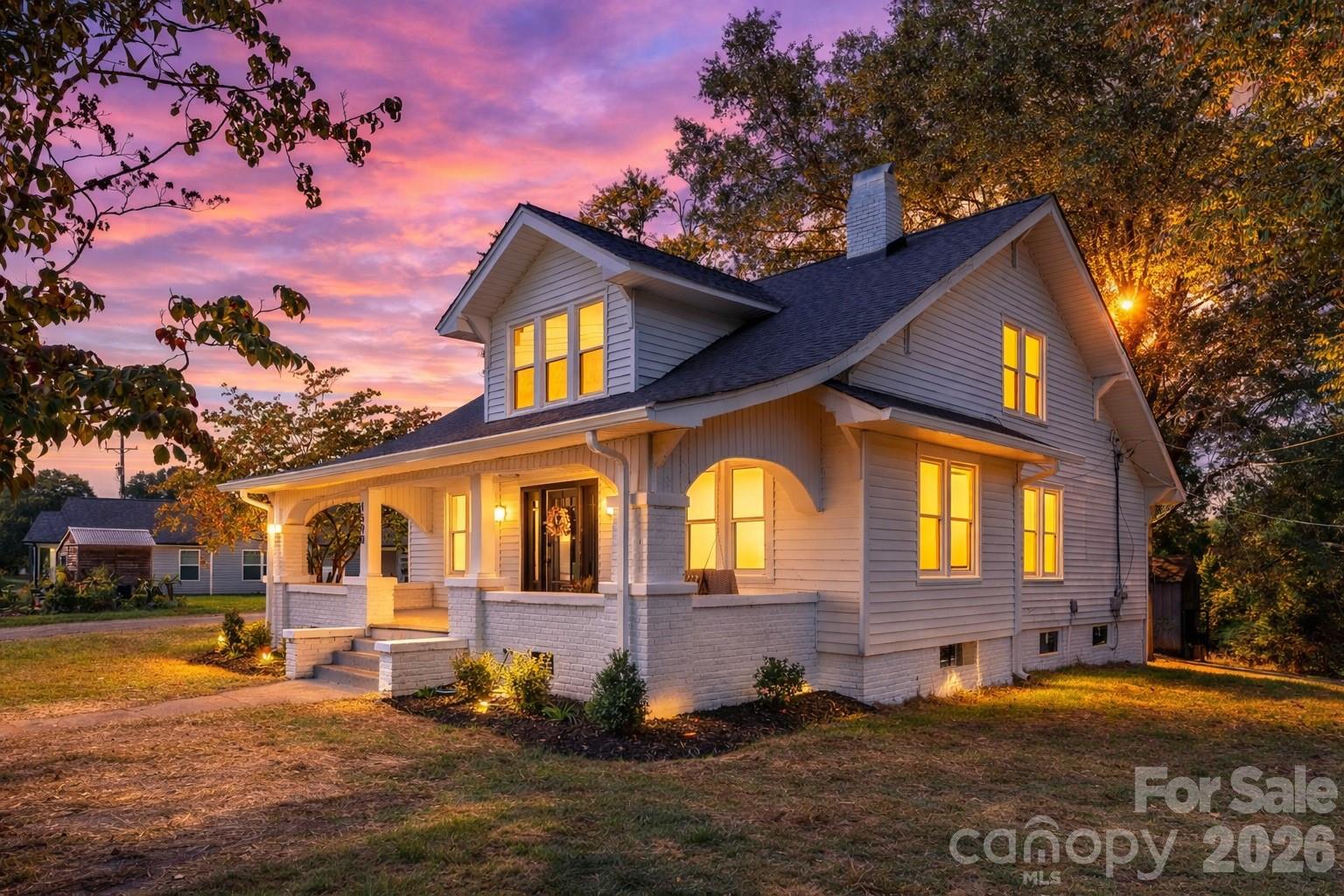 1590 South Center Street Hickory, NC 28602 - Photo 2 of 29 a front view of a house with a yard