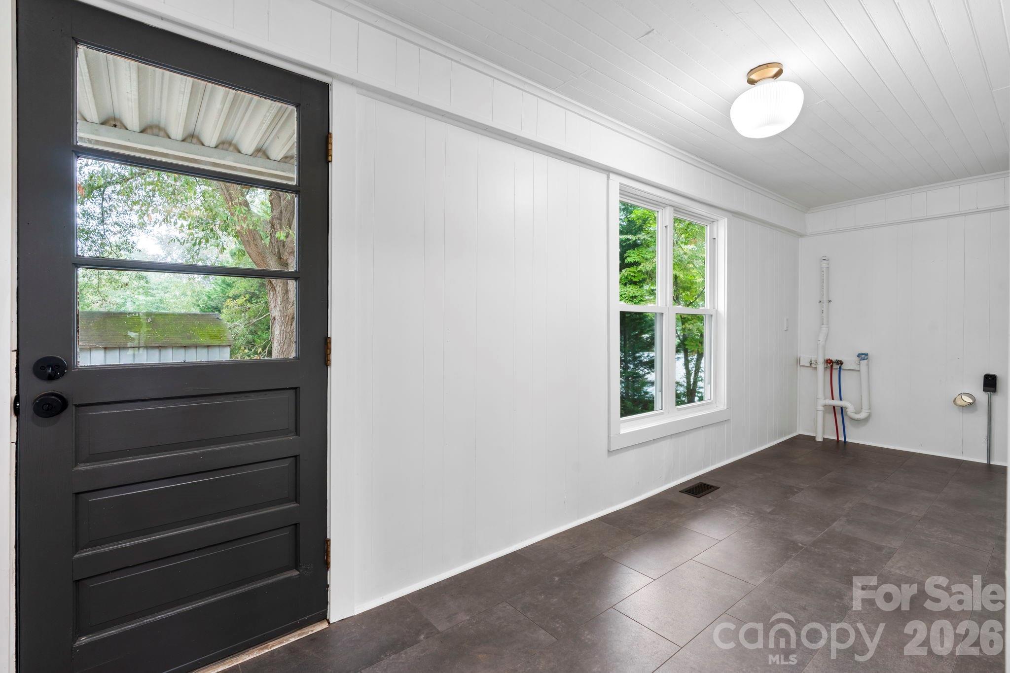 1590 South Center Street Hickory, NC 28602 - Photo 22 of 29 a view of an empty room with a window
