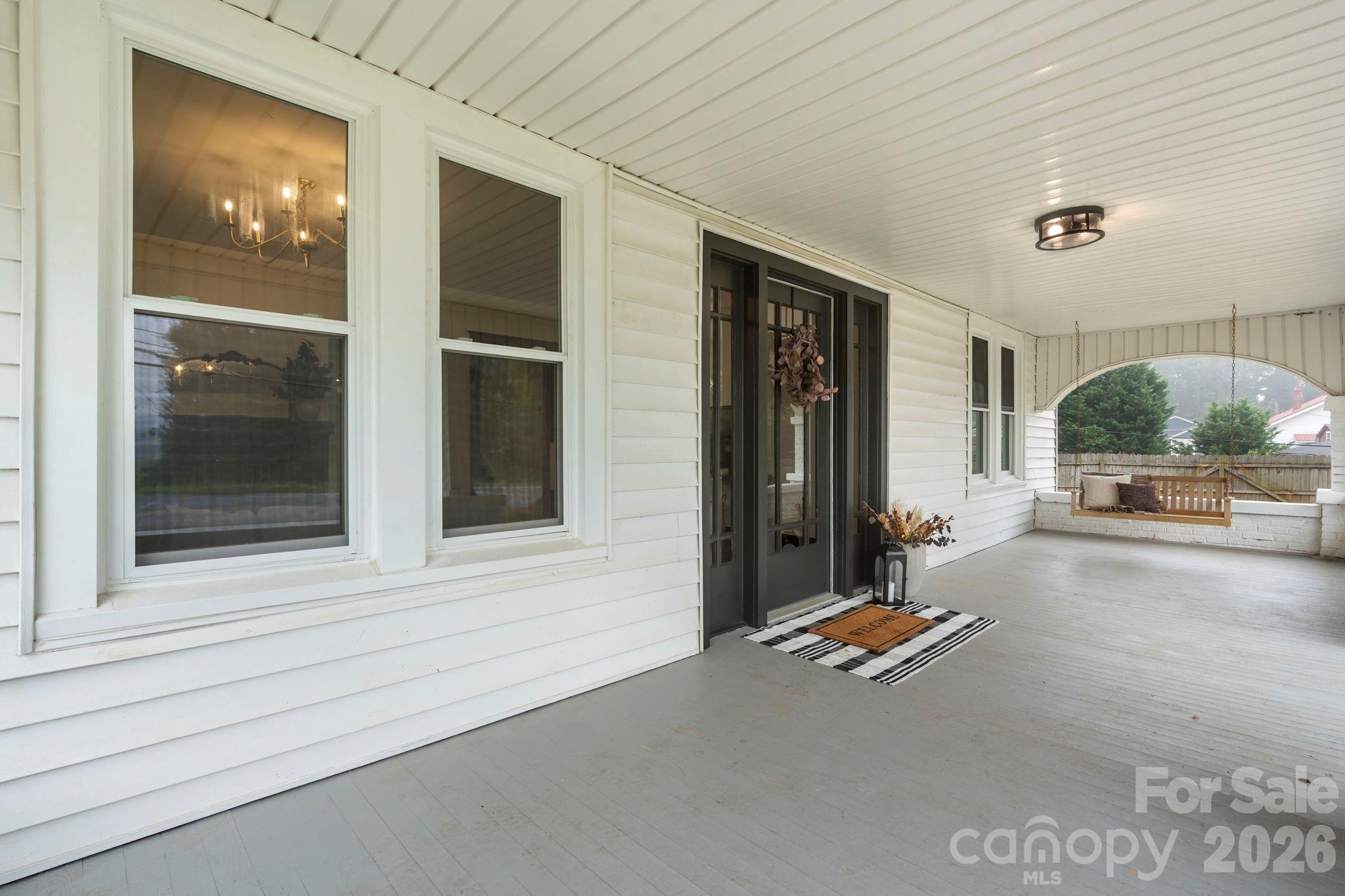 1590 South Center Street Hickory, NC 28602 - Photo 25 of 29 a living room with a large window and couch