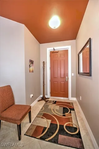 a room with furniture and a window