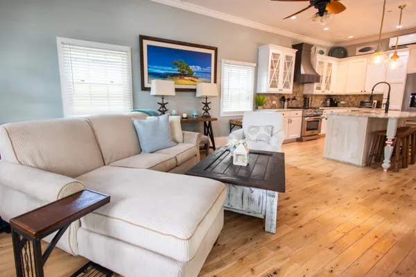 a living room with furniture and a window