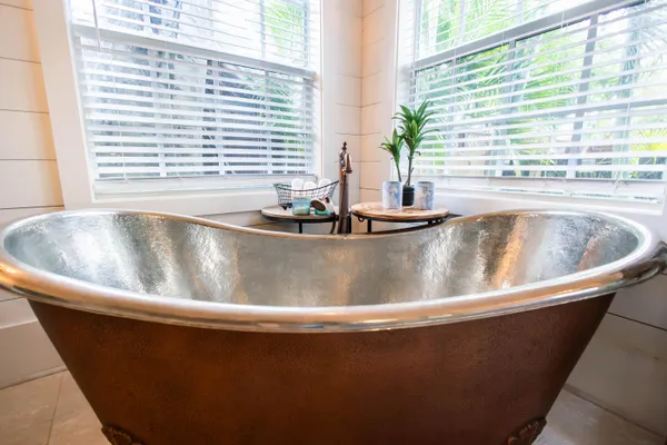 a view of a sink and a window