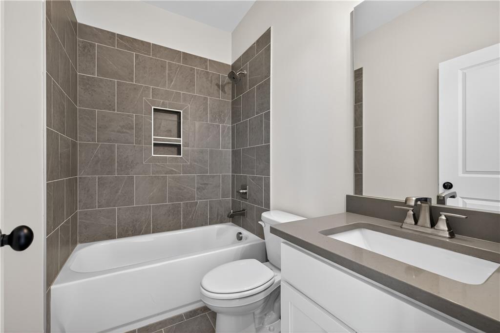 3787 Cheyenne Lane Jefferson, GA 30549 - Photo 37 of 82 a bathroom with a sink a toilet and shower
